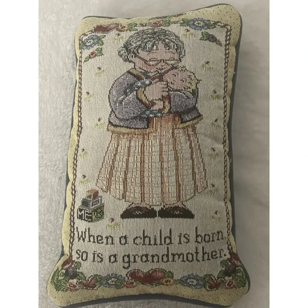 Mary Engelbreit Tapestry Pillow. When A Child Is Born So Is A Grandmother